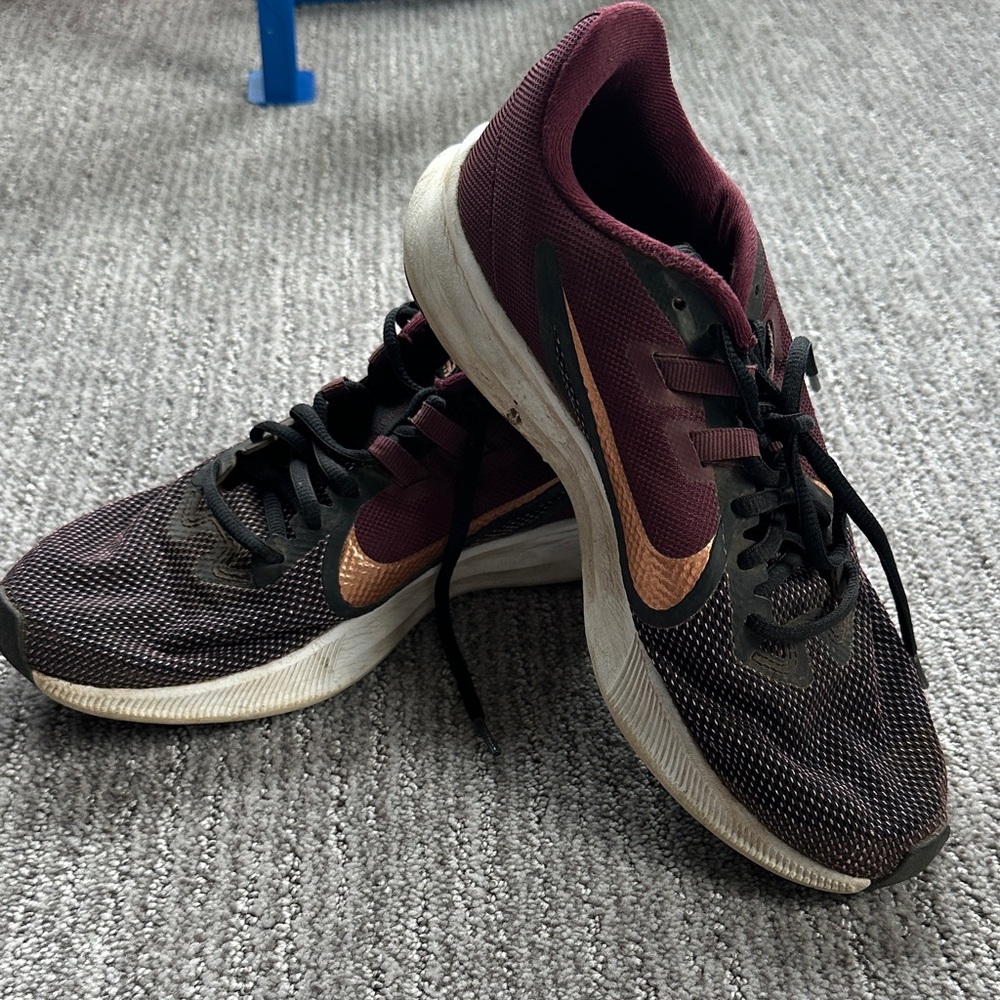 Nike Black and Maroon Sneakers with Gold Swoosh
